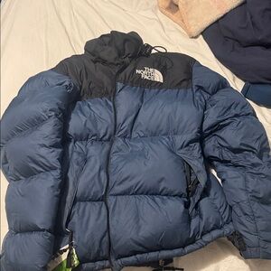 The North Face Blue and Black Puffy Down Jacket